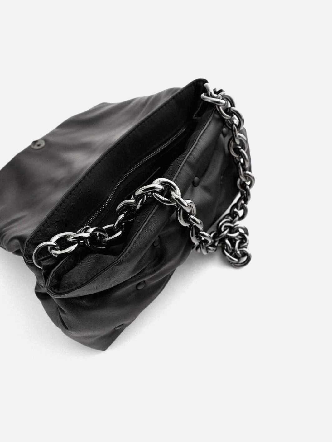 Black quilted bag with chain shoulder strap