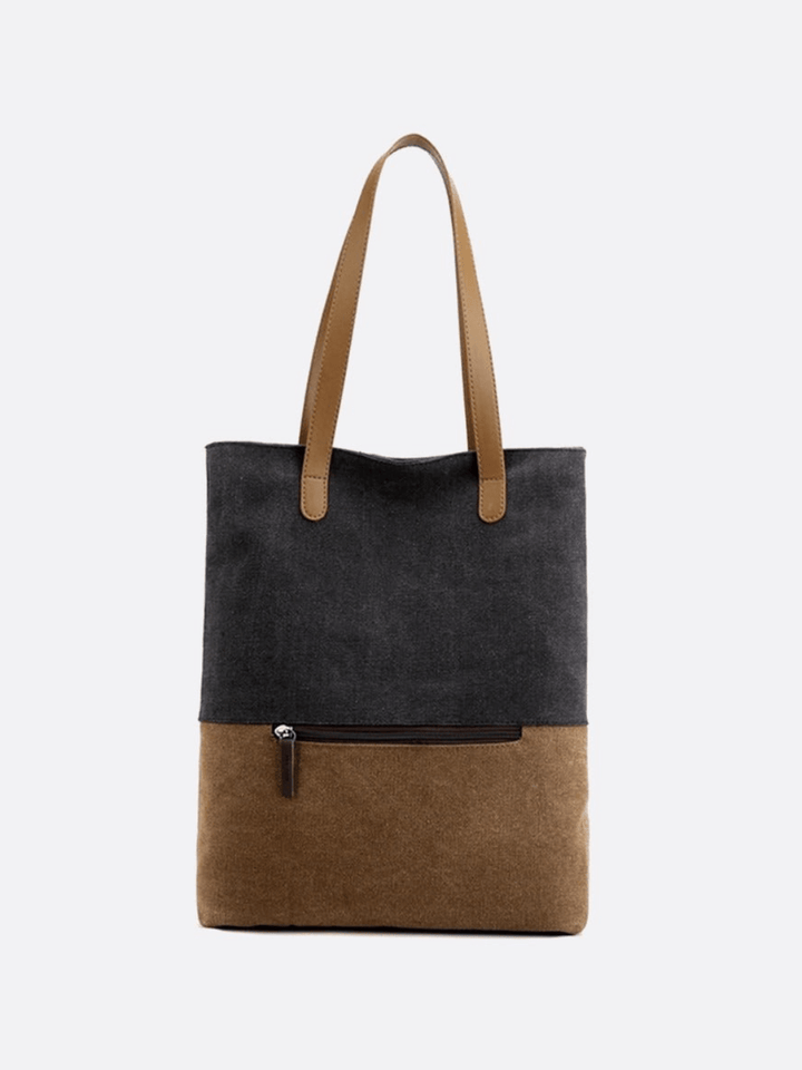 Sac toile noir porté épaule et dos